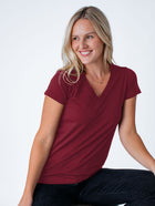 Maddy is 5'8", size 4 and wears a size S # Women's Tee | Cosmic Red V-Neck | Fresh Clean Threads